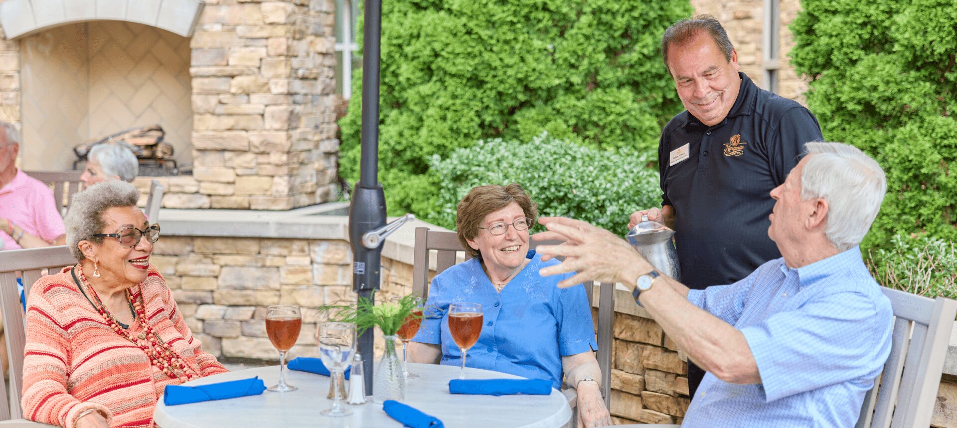 Seniors being served by a staff member