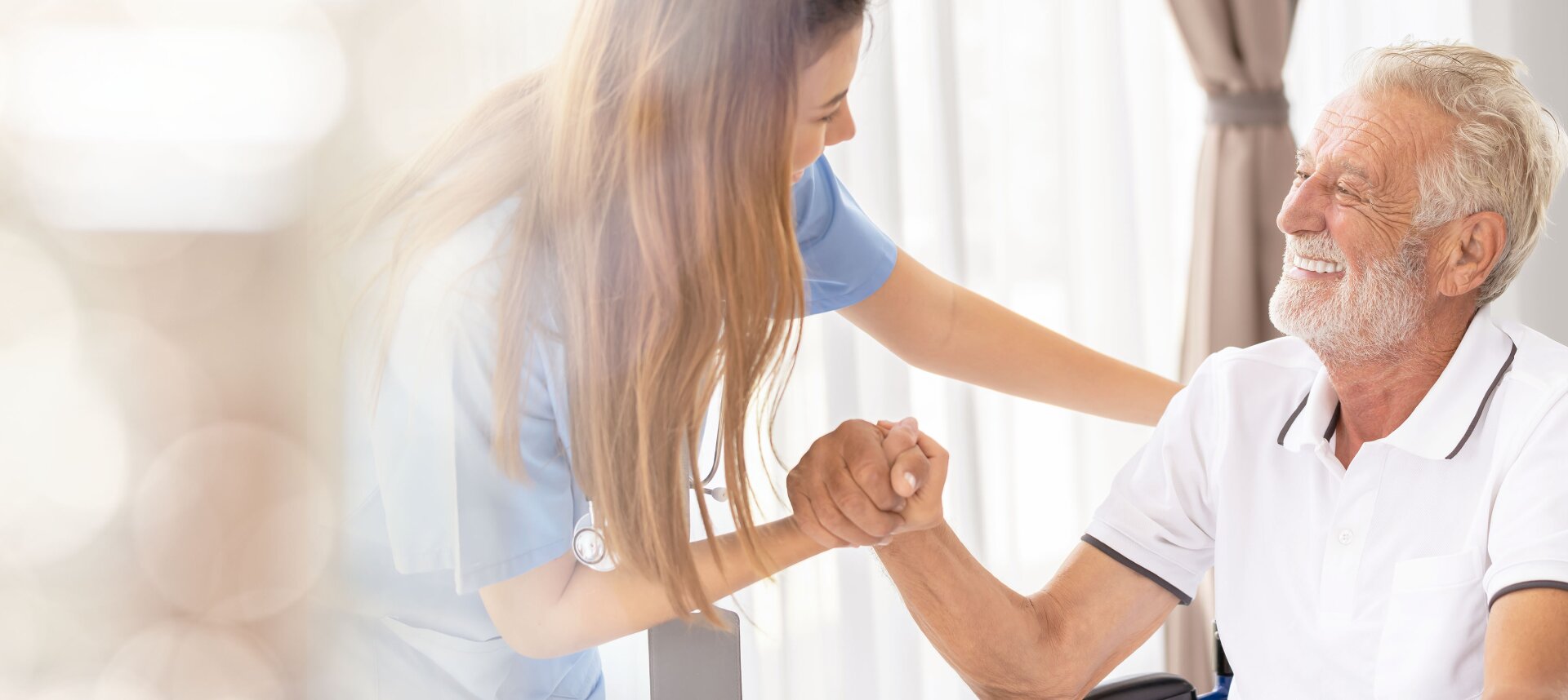 Nurse assisting senior woman